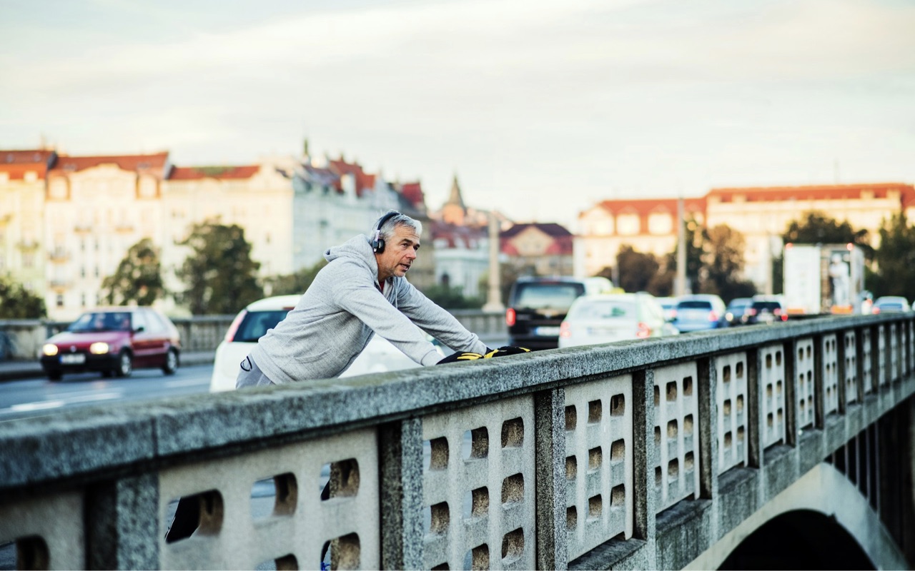 A man stretching during his morning run