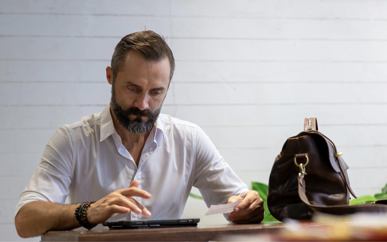 An entrepreneur checking his cash flow